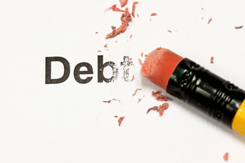 pencil erasing the word debt