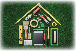 shape of a house made with different home improvement tools like brushes, rulers, paint sticks, hammer