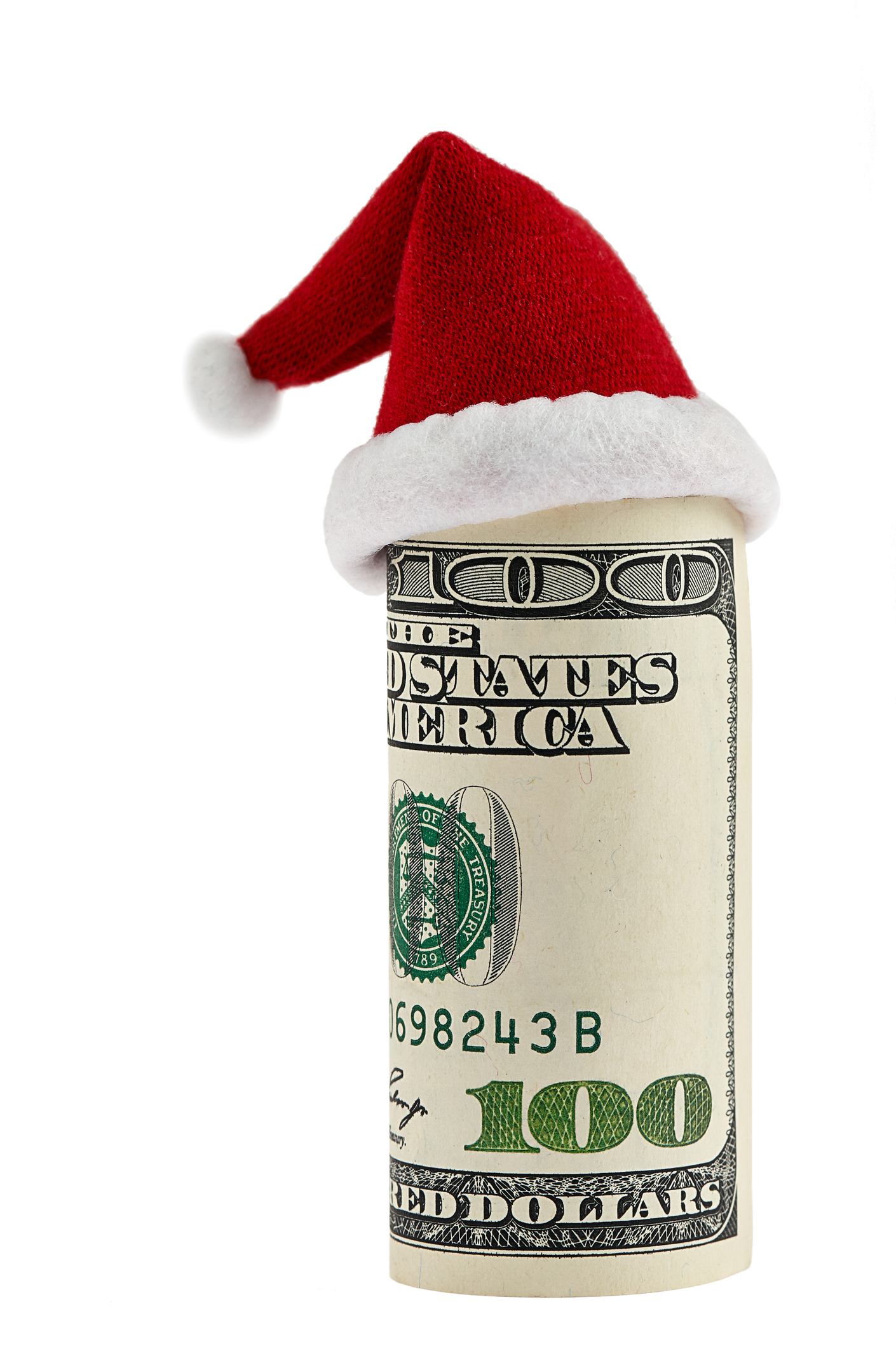 A hundred dollar roll in Christmas Santa hat isolated on white